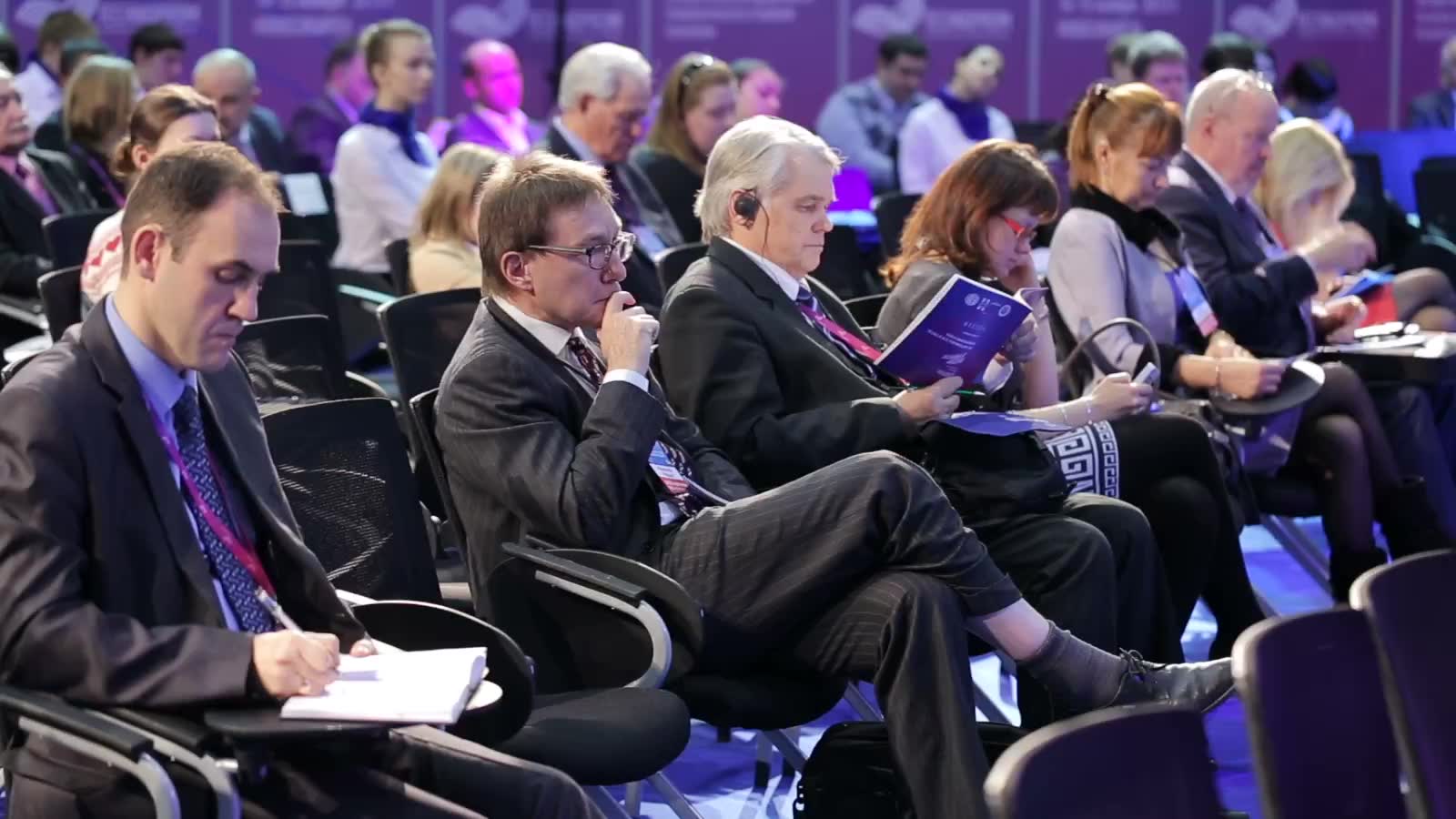 Seated delegates at an industry forum